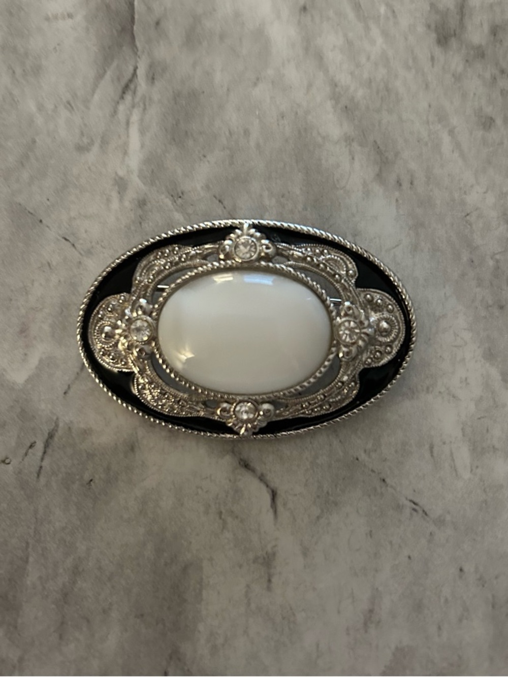 Vintage-Inspired Oval Brooch with White Cabochon